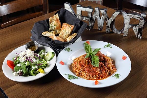 One of MANY Lunch Special Deals!! Our Famous Spaghetti with Homemade Meatballs..includes a side Greek Salad.