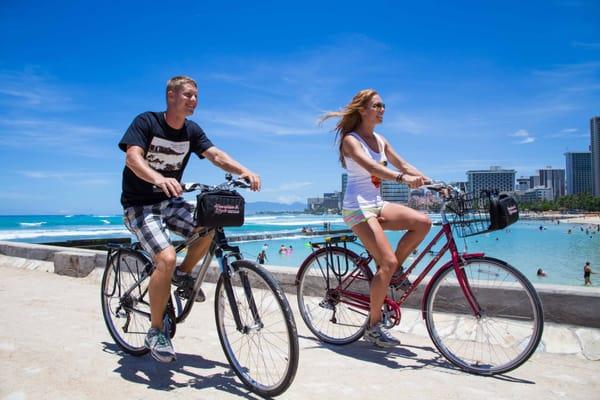 Bike riding through Waikiki.