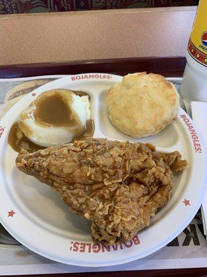 Chicken breast plate, with mashed potatoes & brown gravy, and their signature buttery biscuit