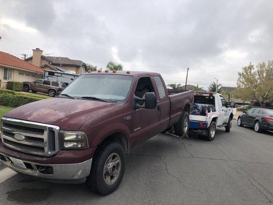 F250 being towing . Rialto towing service