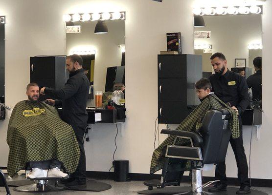 Barbers working hard.