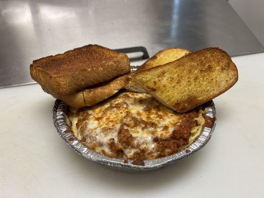 Baked Spaghetti with Garlic toast.