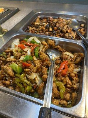 Spicy chicken and chicken and mushrooms on the buffet bar