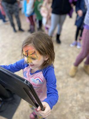 Face painting by Pipsqueak's Party Time. 
(Parent gave permission to use photo.)