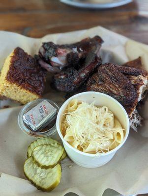 Dry chicken, pork ribs, cheddar mac and cheese, and cornbread