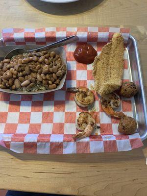 Fried catfish, grilled shrimp with beans and rice