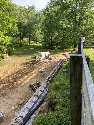 Laying the base of the new wall