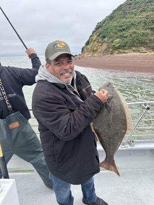 Rudy first catch of the day halibut