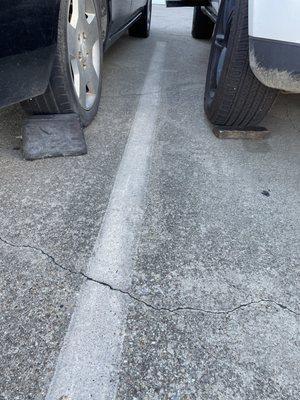 Vehicle over 20 years old properly secured with a rubber stop.  Mine secured with a wooden post.  I could barely get inside.