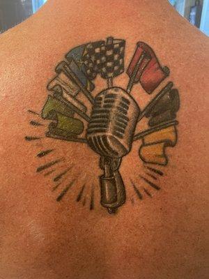 Tattoo representing my 20+ years of involvement in Motorsports, as an announcer and flag man.