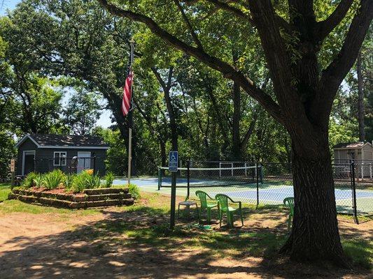 A view of our gorgeous pickle ball court with two pétanque courts in the background