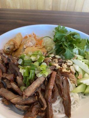 Grilled Pork with Rice Vermicelli - Bun Thit Nuong with egg roll.     The