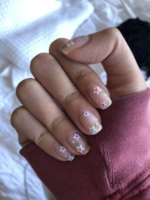 Gel manicure with hand painted floral design!