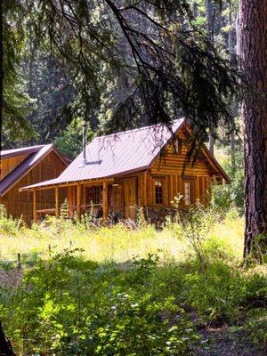 Your own cabin with bed, wood fire stove, bathroom and front porch