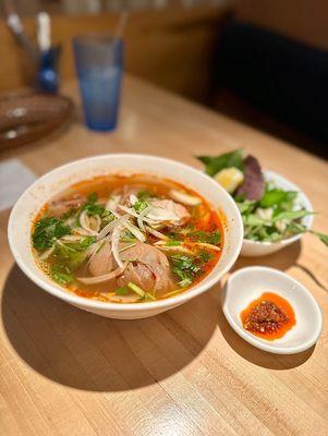 Bun Bo Dac Biet Cha Hue (spicy beef noodle soup with pork patty)