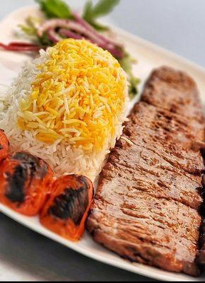 Tender Beef Kabob(Barg): Heart of Tenderloin served with White Basmati Rice with Safron Topping