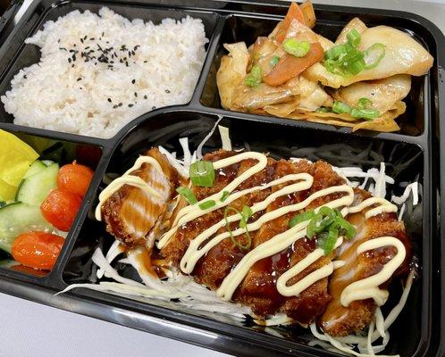 TONKATSU
 Crispy fried pork cutlet, drizzled with Japanese mayo and sweet and savory sauce on top