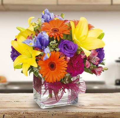 IBE435 Springtime - a long time favorite!  Nice mix of spring flowers in rectangular vase.