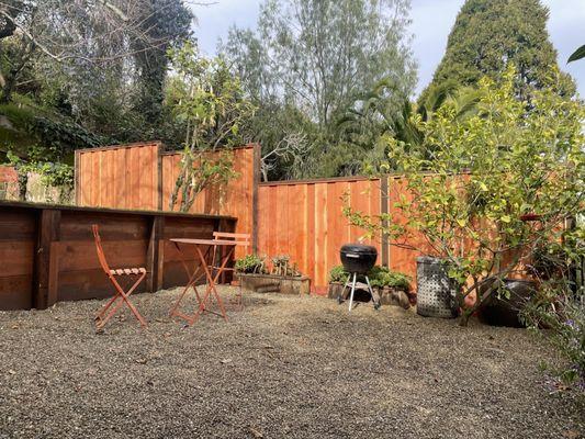 New fence; pebble ground cover