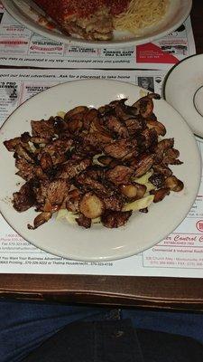 Sirloin beef tips over penne.