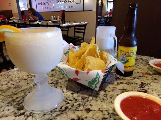 House margarita (medium) with chips and salsa. Chips are thin and crispy -- tasty!