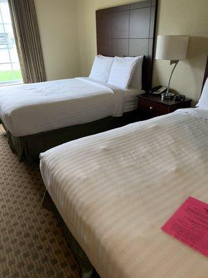 Bed area at the Cobblestone Inn and Suites at Ambridge, PA.