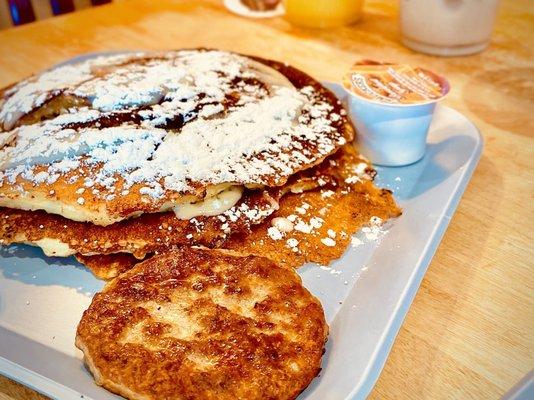 Cinnamon Roll Pancakes with sausage and syrup