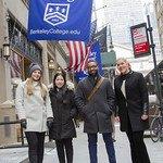 Berkeley College students standing outside the NYC campus during the winter season.