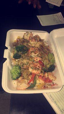 Shrimp and broccoli loaded potato steak and lobster