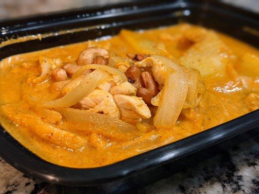 Massaman Curry with chicken. $12. Potatoes, onions, and cashews in coconut milk.