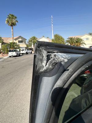 Damaged door before repair.