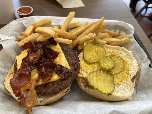 Bacon Cheese Burger with mustard and pickles. Hadn't eaten here since we moved offices as we were next door. Great burger !!!