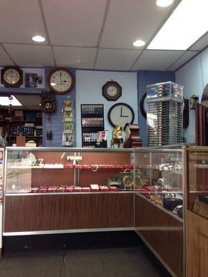 The top clock is hilarious. It's a mirror image of a clock- works backwards! Perfect gag gift for those with dementia. Ha!