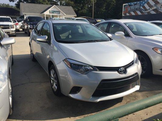 2015 Toyota Corolla with 37k miles, all power, backup camera, bluetooth, and over 30mpg!