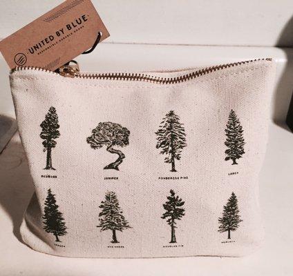 The organic cotton toiletries bag I bought featuring evergreen trees