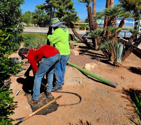 Zach and Mark working on pumping out a mess of a septic system.