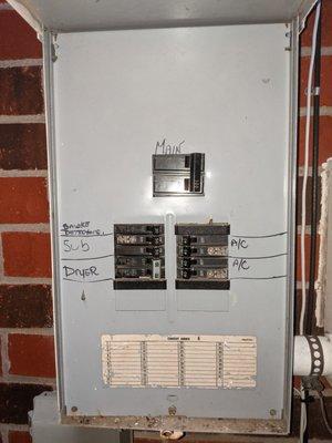 The two circuits for the old HVAC systems.  They replaced the unit, but didn't check that the circuit met the requirements of the system.