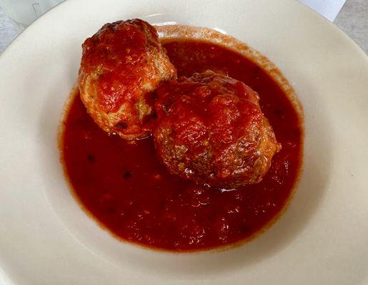 Side of meatballs. Loved them! Good marinara sauce too.