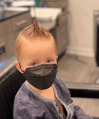 Kid's faux hawk hair cut