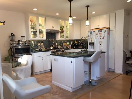 One year later, the Anastasia soapstone countertops and backsplash now have a gorgeous patina~looks awesome, huh (my kitchen design)!