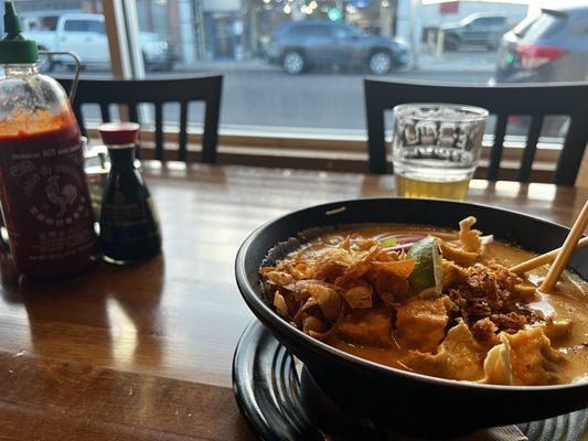 A local beer and an a perfectly seasoned dish.