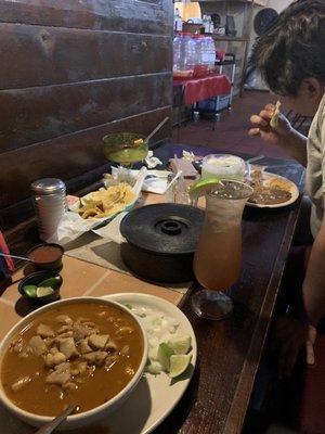 Menudo, carne guisada , Chile and salsa. Drinks!!