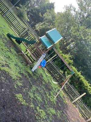 Removal of old playset. Assembly of brand new playset .