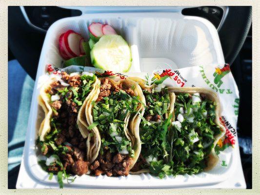 Carne asada tacos: skirt steak, onion, and cilantro. Amazing!!!