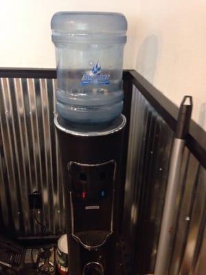 This Alhambra water cooler delivers refreshing chilled water to the patrons.