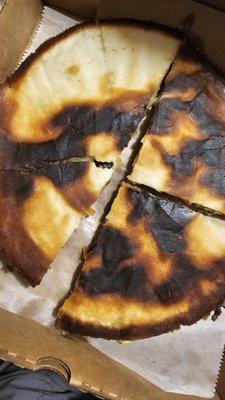 Burnt pizza.