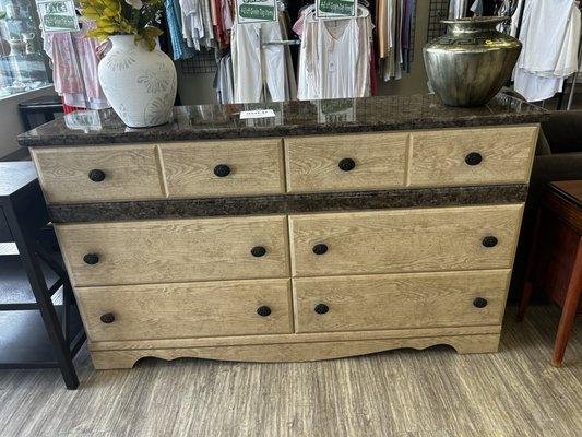 This is a dresser I recently purchased! It has 6 long, deep drawers w/ a faux granite top that looks like real granite, but w/o the weight