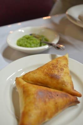 Name escapes me, but it's a pastry filled w/spicy beef w/a side of spicy green stuff to top it with.  it was good! (appetizer)