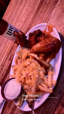 Cheese fries and wings.