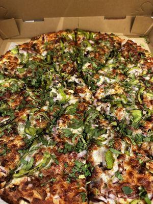 butter chicken pizza has cilantro but not listed on menu